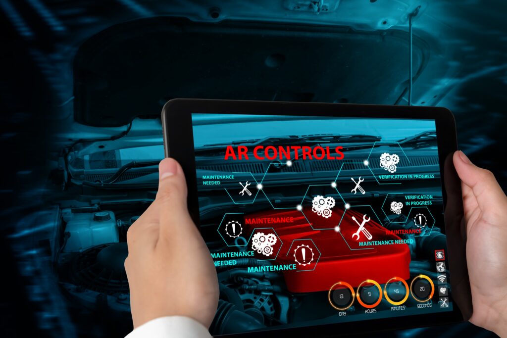 Engineer use augmented reality software to monitor parts of car vehicle